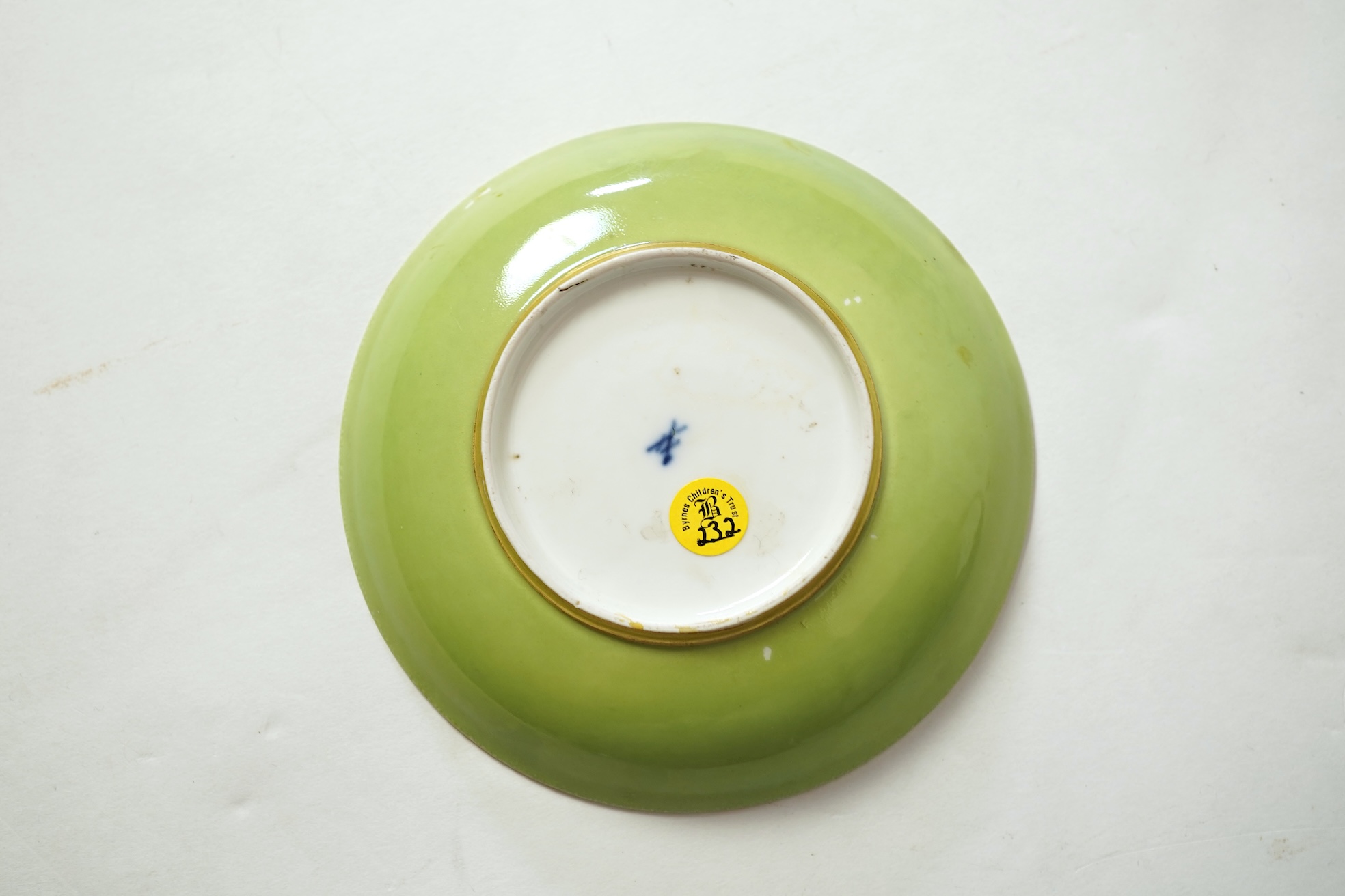 A Meissen cup and saucer, similar tea bowl and two saucers, c.1735-45